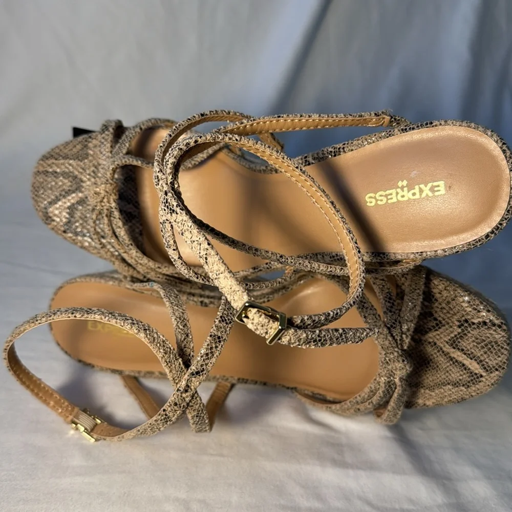 NWT Express black/tan snake print wedge sandals. Size 9. Fabric uppers.
